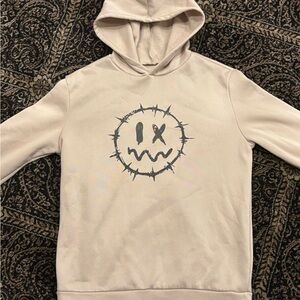 Cream Hoodie with Graphic Design